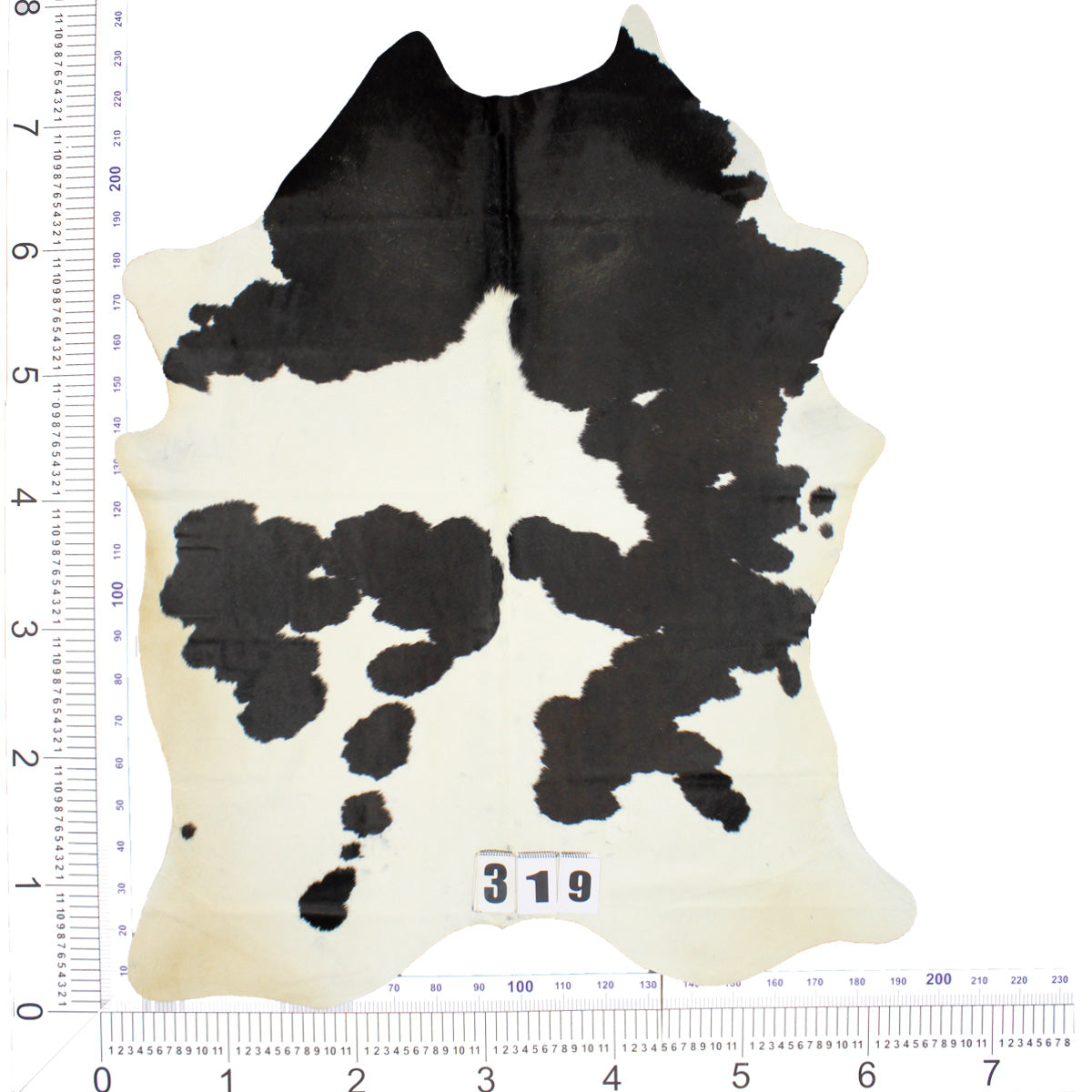 Traditional Black and White Brazilian Cowhide Rug 